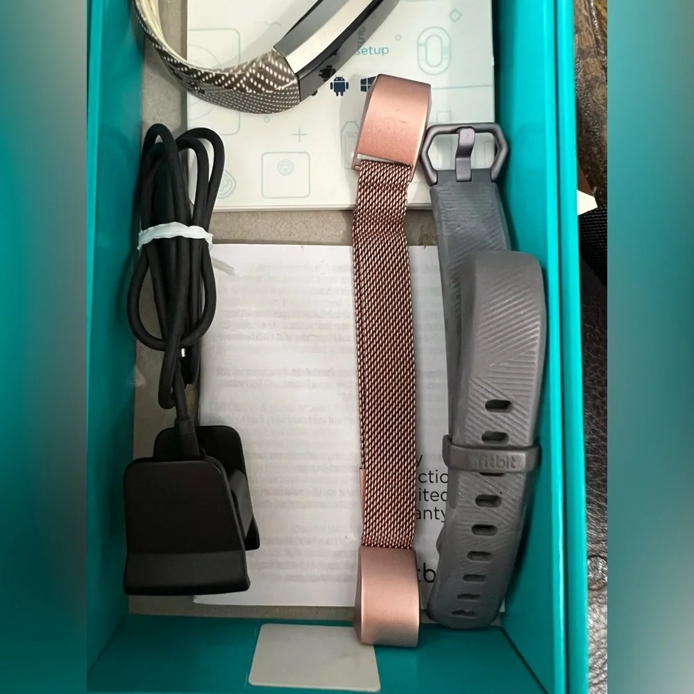 Fitbit Black Fitness Wristband S-L, includes multiple bands.